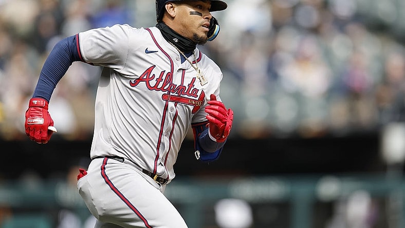 Apr 1, 2024; Chicago, Illinois, USA; Atlanta Braves shortstop Orlando Arcia (11) runs to second base after hitting a two-run double against the Chicago White Sox during the fourth inning at Guaranteed Rate Field. Mandatory Credit: Kamil Krzaczynski-USA TODAY Sports