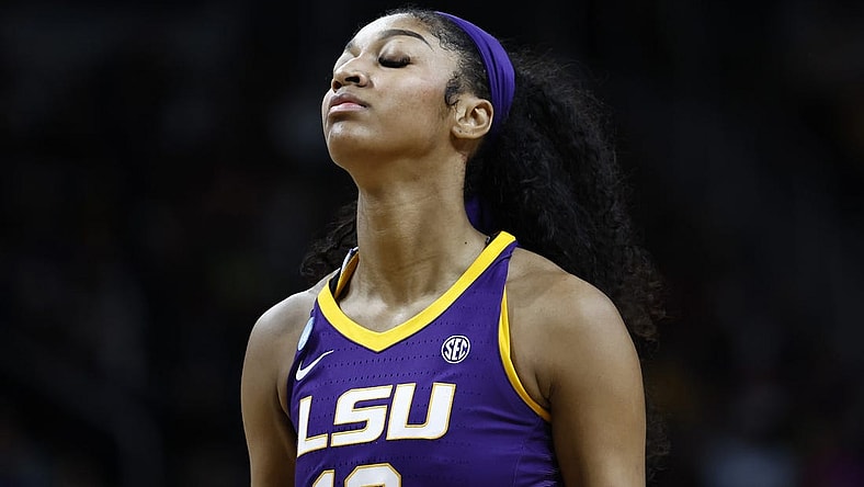 Apr 1, 2024; Albany, NY, USA; LSU Lady Tigers forward Angel Reese (10) reacts in the fourth quarter against the Iowa Hawkeyes in the finals of the Albany Regional in the 2024 NCAA Tournament at MVP Arena. Mandatory Credit: Winslow Townson-USA TODAY Sports