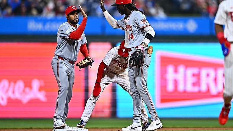 Apr 1, 2024; Philadelphia, Pennsylvania, USA; Cincinnati Reds third baseman Jeimer Candelario (3) and shortstop Elly De La Cruz (44) celebrate after a tag-out against the Philadelphia Phillies in the eighth inning at Citizens Bank Park. Mandatory Credit: Kyle Ross-USA TODAY Sports