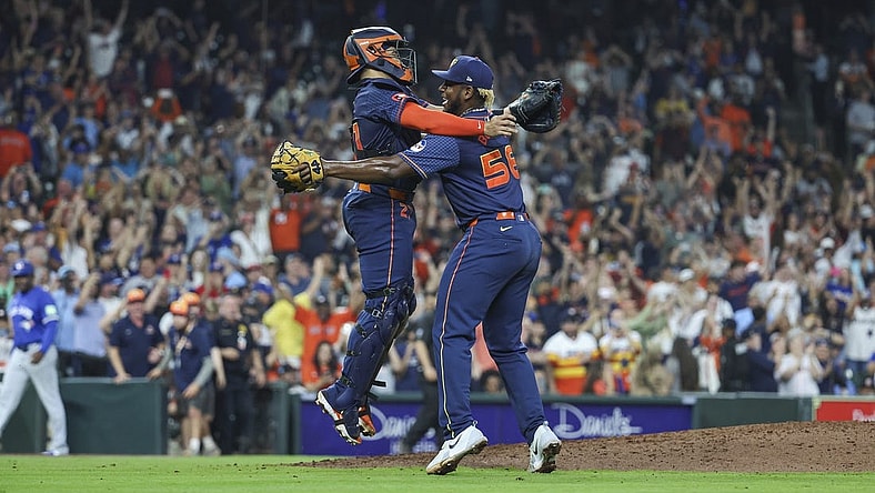 Apr 1, 2024; Houston, Texas, USA; Houston Astros starting pitcher Ronel Blanco (56) celebrates with catcher Yainer Diaz (21) after throwing a no-hitter against the Toronto Blue Jays at Minute Maid Park. Mandatory Credit: Troy Taormina-USA TODAY Sports