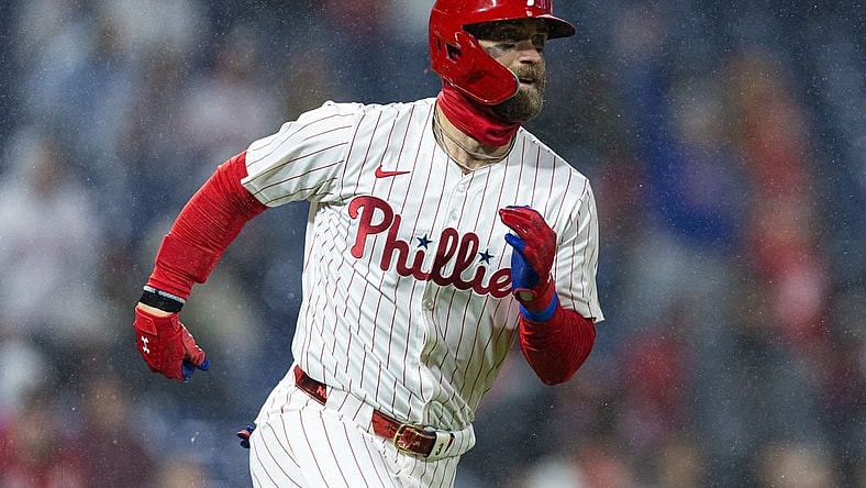 Apr 2, 2024; Philadelphia, Pennsylvania, USA; Philadelphia Phillies first baseman Bryce Harper (3) runs the bases after hitting his second home run of the game during the fourth inning against the Cincinnati Reds at Citizens Bank Park. Mandatory Credit: Bill Streicher-USA TODAY Sports