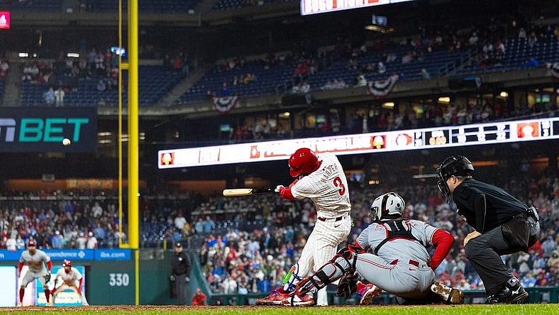 Apr 2, 2024; Philadelphia, Pennsylvania, USA; Philadelphia Phillies first baseman Bryce Harper (3) hits a four RBI grand slam during the seventh inning against the Cincinnati Reds at Citizens Bank Park. Mandatory Credit: Bill Streicher-USA TODAY Sports