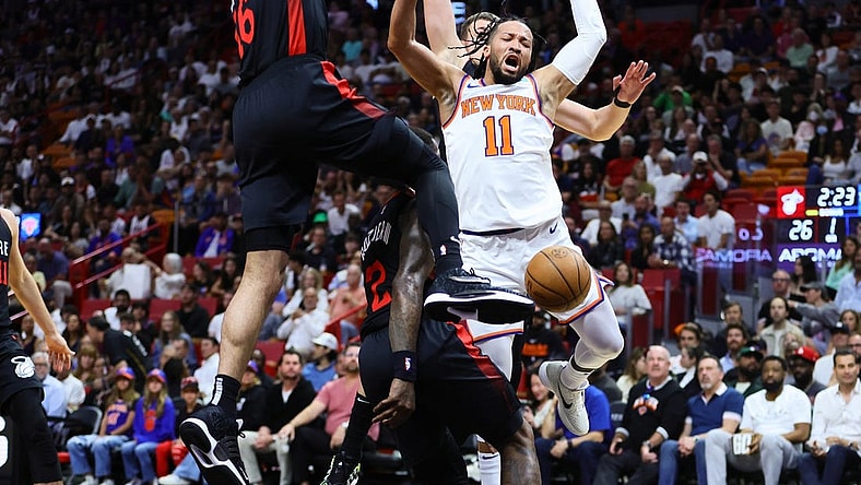 Apr 2, 2024; Miami, Florida, USA; New York Knicks guard Jalen Brunson (11) reacts after driving to the basket against Miami Heat forward Caleb Martin (16) during the first quarter at Kaseya Center. Mandatory Credit: Sam Navarro-USA TODAY Sports