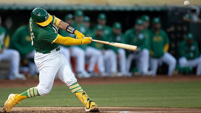Apr 2, 2024; Oakland, California, USA; Oakland Athletics catcher Shea Langeliers (23) hits a two-run home run against the Boston Red Sox during the second inning at Oakland-Alameda County Coliseum. Mandatory Credit: D. Ross Cameron-USA TODAY Sports