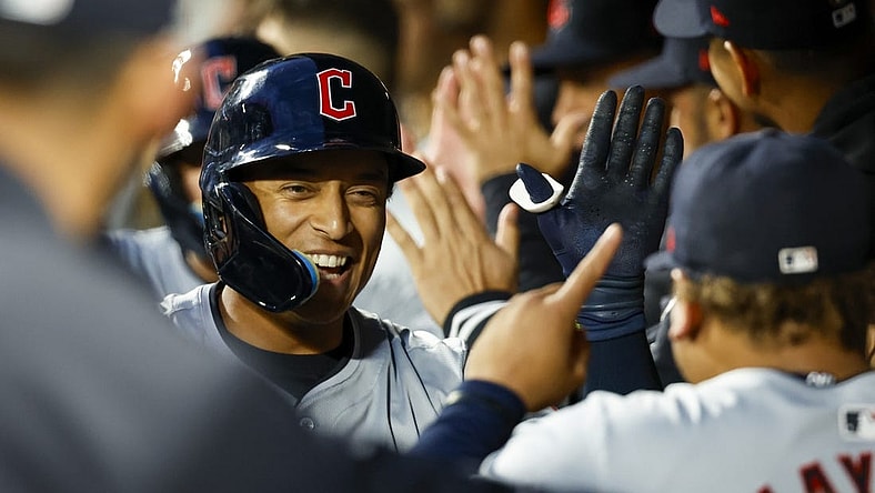 Apr 2, 2024; Seattle, Washington, USA; Cleveland Guardians designated hitter Bo Naylor (23) celebrates in the dugout after hitting a two-run home run against the Seattle Mariners during the fourth inning at T-Mobile Park. Mandatory Credit: Joe Nicholson-USA TODAY Sports