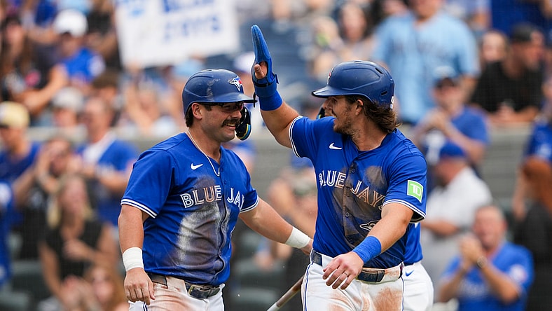 MLB: Davis Schneider & Addison Barger, Toronto Blue Jays, celebrate