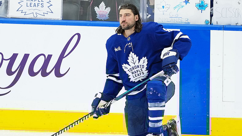 NHL: Chris Tanev, Toronto Maple Leafs defenseman, kneels on one knee