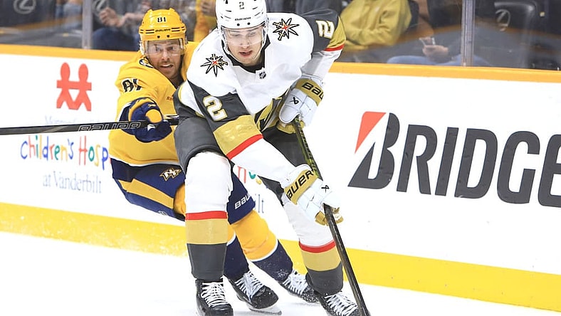 NASHVILLE, TN - MARCH 29: Nashville Predators forward Jonathan Marchessault (81) defends against Vegas Golden Knights defenseman Zach Whitecloud (2) during the NHL game between the Nashville Predators and Vegas Golden Knights, held on March 29, 2025, at Bridgestone Arena in Nashville, Tennessee. (Photo by Danny Murphy/Icon Sportswire)