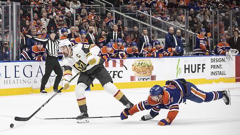 Vegas Golden Knights' Mark Stone (61) get the open net goal as Edmonton Oilers' Connor McDavid (97) tries to stop him during the third period of an NHL hockey game Wednesday, Nov. 6, 2024 in Edmonton, Alberta. (Jason Franson/The Canadian Press via AP)