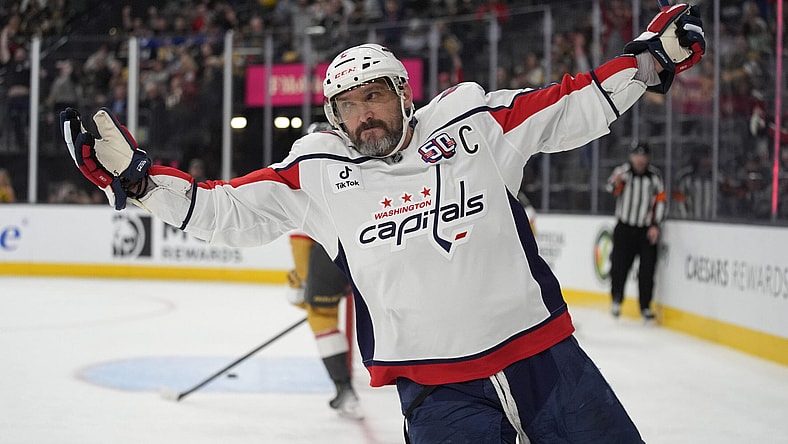 Washington Capitals left wing Alex Ovechkin (8) celebrates after scoring against the Vegas Golden Knights for a hat trick during the third period of an NHL hockey game Sunday, Nov. 17, 2024, in Las Vegas. (AP Photo/John Locher)