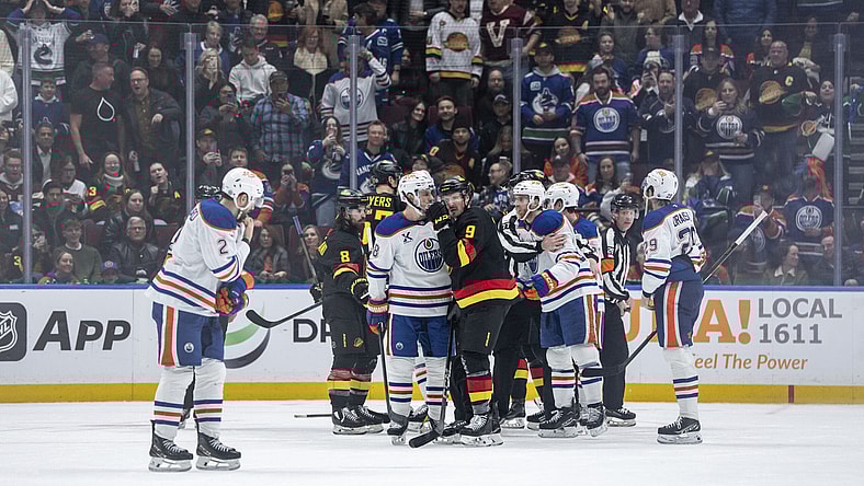 Evan Bouchard, Tyler Myers, Connor McDavid, Conor Garland, Leon Draisaitl, JT Miller, Ryan Nugent-Hopkins, Elias Pettersson, Zach Hyman