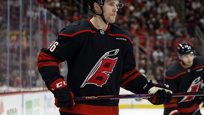 Carolina Hurricanes' Mikko Rantanen (96) waits for a face-off against the Chicago Blackhawks during the second period of an NHL hockey game in Raleigh, N.C., Sunday, Feb. 2, 2025. (AP Photo/Karl DeBlaker)