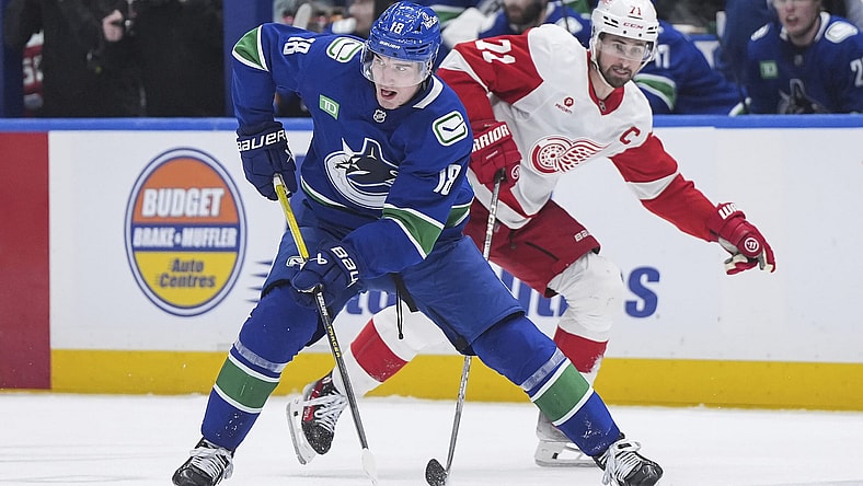 Former Golden Knights trade target and Vancouver Canucks winger Drew O'Connor skates with the puck