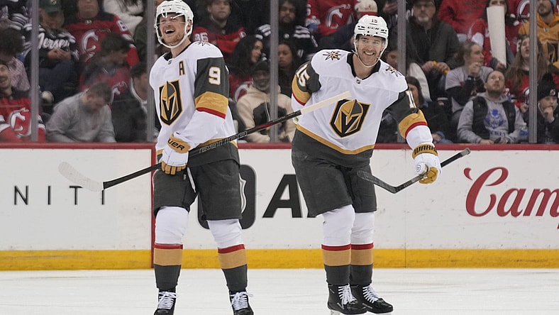 Vegas Golden Knights' Jack Eichel, left, celebrates his goal with Noah Hanifin during the third period of an NHL hockey game against the New Jersey Devils in Newark, N.J., Thursday, Feb. 6, 2025. (AP Photo/Seth Wenig)