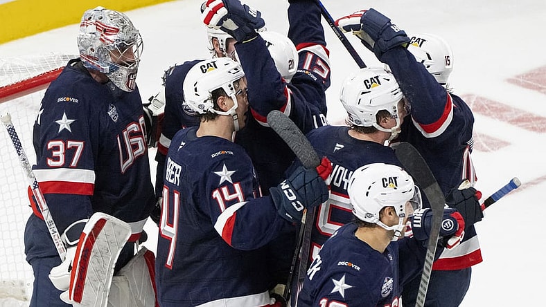 United States players celebrates their win over Canada following third period 4 Nations Face-Off hockey game in Montreal on Saturday, Feb. 15, 2025. (Christinne Muschi/The Canadian Press via AP)