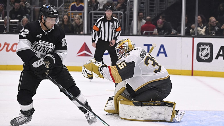 Los Angeles Kings left wing Kevin Fiala (22) skates to the puck with Vegas Golden Knights goaltender Ilya Samsonov (35) defending during the second period of an NHL hockey game in Los Angeles, Monday, Feb. 24, 2025. (AP Photo/Alex Gallardo)