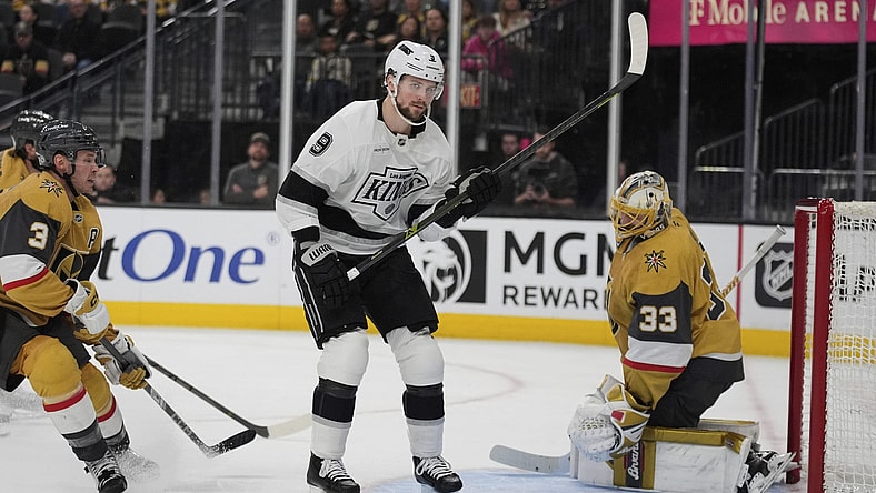 Los Angeles Kings right wing Adrian Kempe (9) scores against Vegas Golden Knights goaltender Adin Hill (33) during the third period of an NHL hockey game Sunday, March 9, 2025, in Las Vegas. (AP Photo/John Locher)