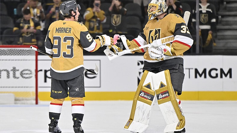 Adin Hill gives the victory flamingo to Mitch Marner 9/25/2025 (Photo/Screenshot- Vegas Golden Knights via Twitter)