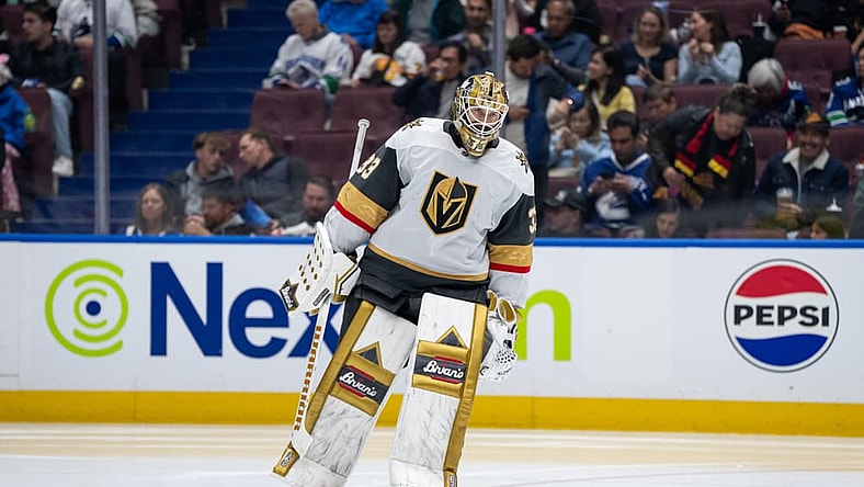 VANCOUVER, BC - APRIL 06: Vegas Golden Knights goaltender Adin Hill (33) waits for a face off during the third period of an NHL game between the Vegas Golden Knights and the Vancouver Canucks on Sunday, April 6, 2025 at Rogers Arena in Vancouver, B.C. (Photo by Ethan Cairns/Icon Sportswire)