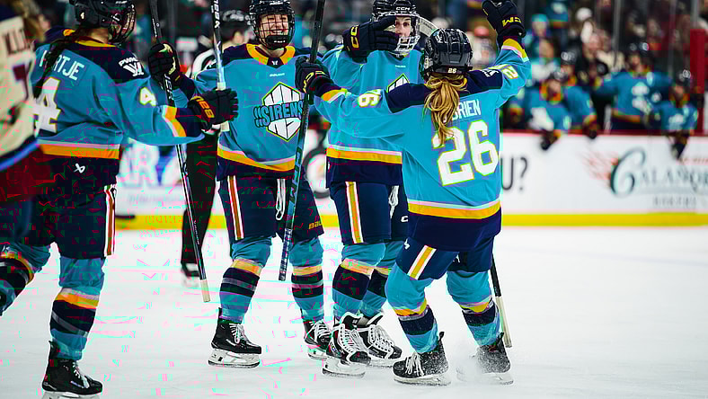 The New York Sirens celebrate a goal against the Montreal Victoire.