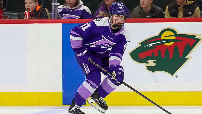 Minnesota Frost forward Denisa Křížová carries the puck against the Montreal Victoire.