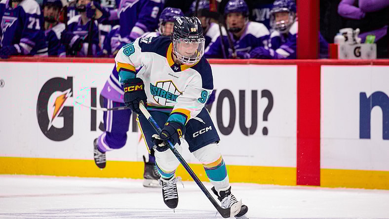 New York Sirens forward Kristyna Kaltounkova carries the puck against the Minnesota Frost.