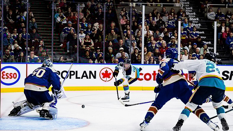 New York Sirens rookie Kristyna Kaltounkova fires a shot against Vancouver Goldeneyes goalie Kristen Campbell.