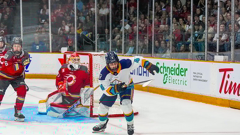 New York Sirens forward Elle Hartje skates away from Ottawa Charge goalie Gwyneth Philips during a 5-1 loss at TD Place.