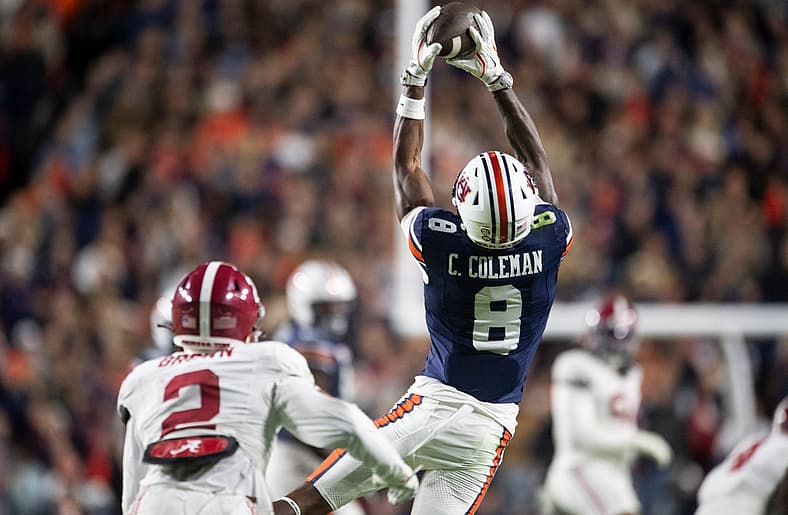 Auburn Tigers wide receiver Cam Coleman (8) catches a pass as Auburn Tigers take on Alabama Crimson Tide in the Iron Bowl at