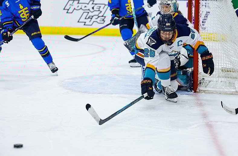 New York Sirens defender Micah Zandee-Hart lunges for a puck against the Toronto Sceptres.