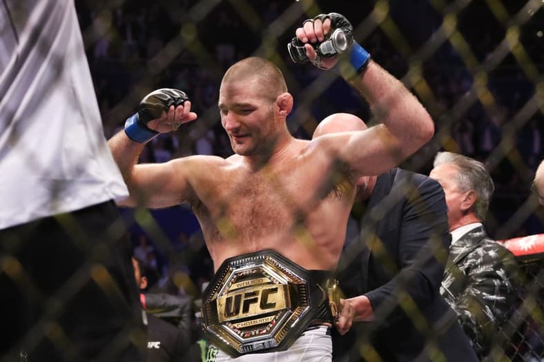 Sep 9, 2023; Sydney, NSW, AUSTRALIA; Sean Strickland (blue gloves) celebrates after defeating Israel Adesanya (not pictured) during UFC 293 at Qudos Bank Arena. Mandatory Credit: Jasmin Frank-USA TODAY Sports