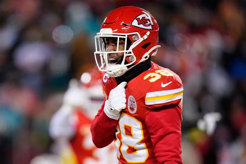 Jan 13, 2024; Kansas City, Missouri, USA; Kansas City Chiefs cornerback L'Jarius Sneed (38) reacts against the Miami Dolphins during the first half of the 2024 AFC wild card game at GEHA Field at Arrowhead Stadium. Mandatory Credit: Jay Biggerstaff-USA TODAY Sports