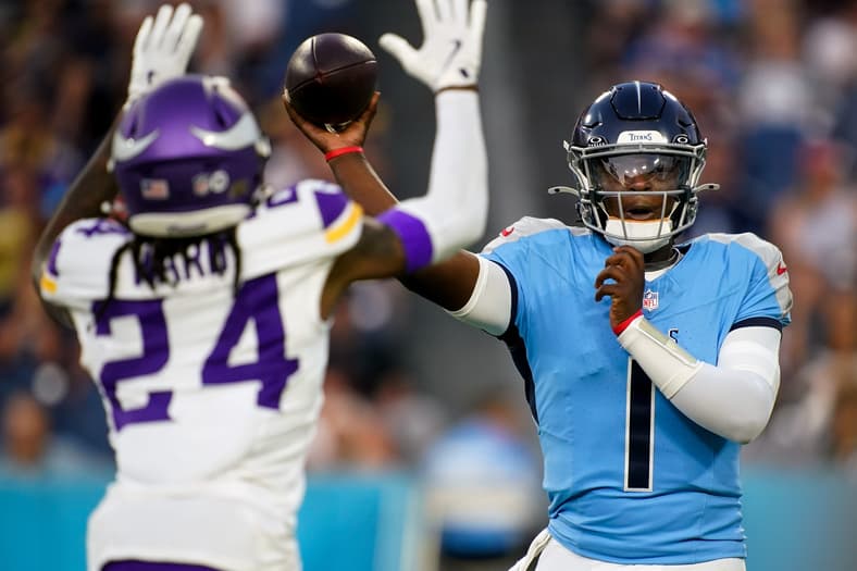 Tennessee Titans quarterback Cam Ward (1) throws the ball over Minnesota Vikings safety Jay Ward (24) during the first quarter