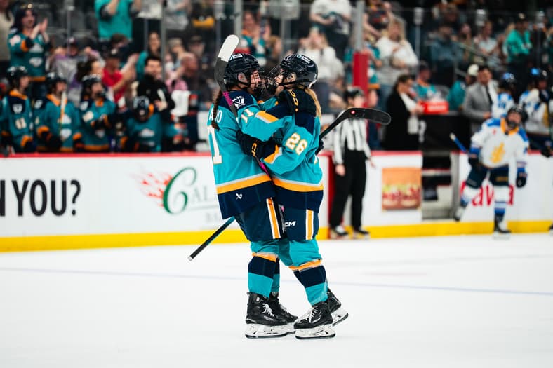 New York Sirens rookies Casey O'Brien and Nicole Vallario celebrate after a goal against the Toronto Sceptres.