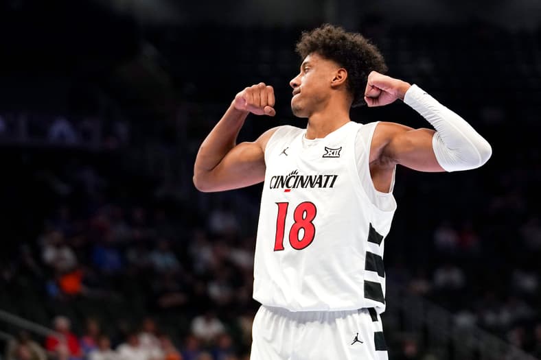 Cincinnati Bearcats forward Baba Miller (18) celebrates after completing a layup after being fouled in the first half of the
