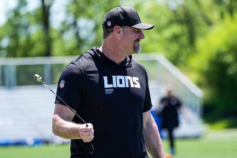 Detroit Lions head coach Dan Campbell walks off the field after practice during OTAs at Meijer Performance Center in Allen Park