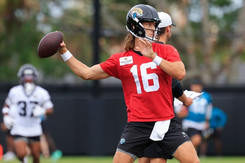 Jacksonville Jaguars quarterback Trevor Lawrence (16) looks to pass during the first day of minicamp at the Miller Electric