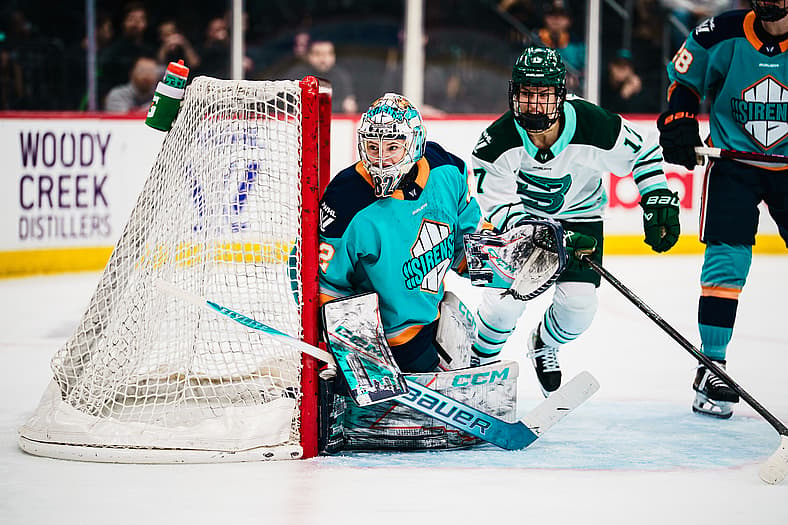 New York Sirens goalie Kayle Osborne hugs the post against the Boston Fleet.