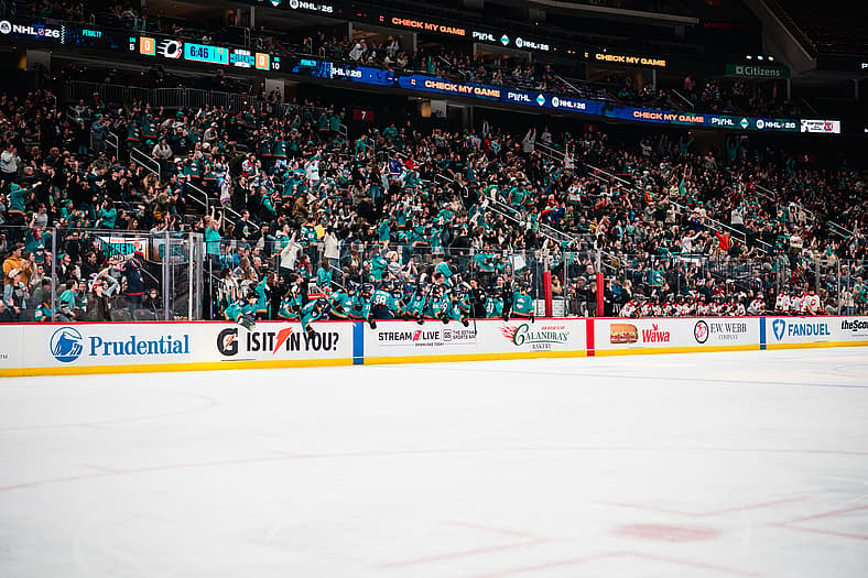 A record crowd of 8,264 fans cheer behind the New York Sirens bench at Prudential Center.