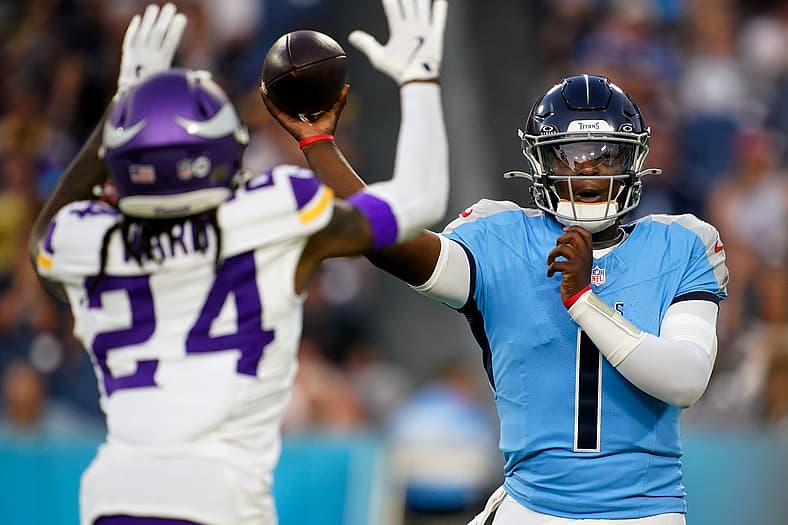 Tennessee Titans quarterback Cam Ward (1) throws the ball over Minnesota Vikings safety Jay Ward (24) during the first quarter