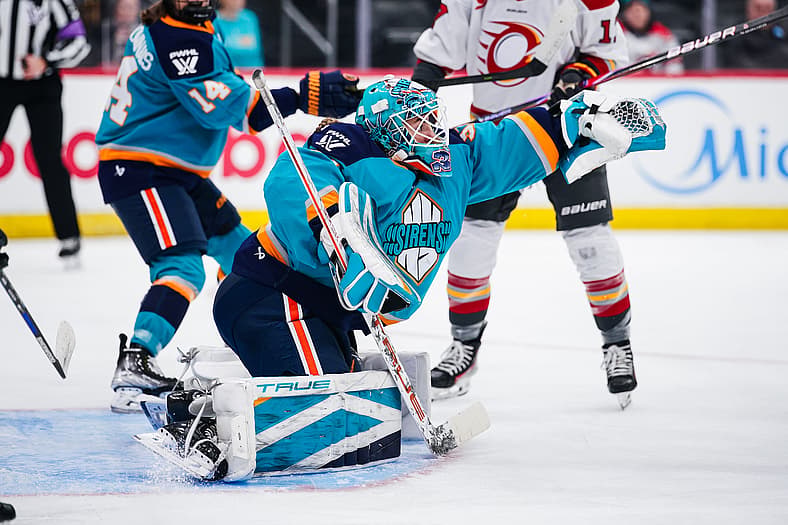 New York Sirens rookie goalie Callie Shanahan makes a glove save in her PWHL debut against the Ottawa Charge.