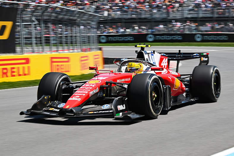 Lewis Hamilton steering the Ferrari SF-26 aduo