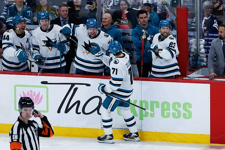 Apr 16, 2026; Winnipeg, Manitoba, CAN; San Jose Sharks forward Macklin Celebrini (71) is congratulated by his team mates on…