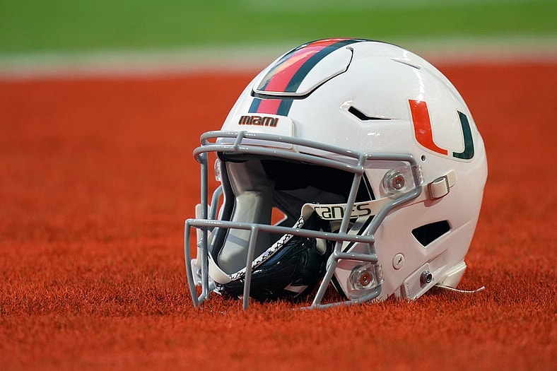 Sep 30, 2021; Miami Gardens, Florida, USA; A general view of a Miami Hurricanes helmet in the end zone prior to the game between the Miami Hurricanes and the Virginia Cavaliers at Hard Rock Stadium. Mandatory Credit: Jasen Vinlove-USA TODAY Sports