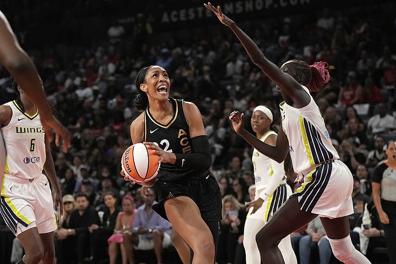 Sep 24, 2023; Las Vegas, Nevada, USA; Las Vegas Aces center A'ja Wilson (22) looks for a clear shot during the second half of game one of the 2023 WNBA Playoffs at Michelob Ultra Arena. Mandatory Credit: Kirby Lee-USA TODAY Sports