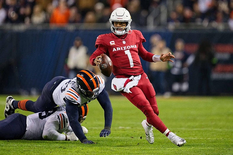Dec 24, 2023; Chicago, Illinois, USA; Arizona Cardinals quarterback Kyler Murray (1) runs with the ball against the Chicago Bears at Soldier Field. Mandatory Credit: Jamie Sabau-USA TODAY Sports