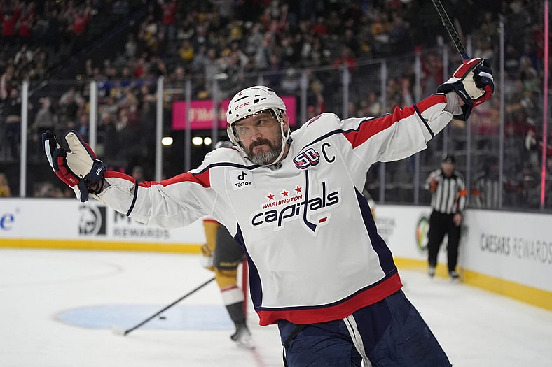Washington Capitals left wing Alex Ovechkin (8) celebrates after scoring against the Vegas Golden Knights for a hat trick during the third period of an NHL hockey game Sunday, Nov. 17, 2024, in Las Vegas. (AP Photo/John Locher)