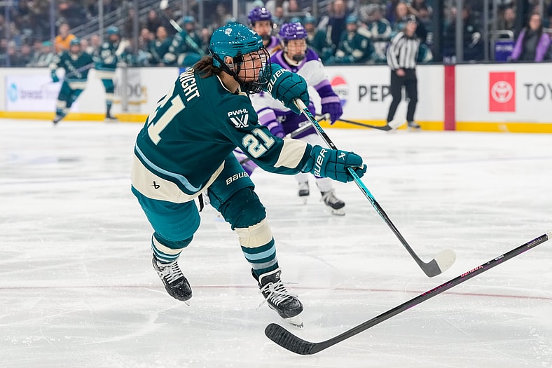 Seattle Torrent captain Hillary Knight fires a shot against the Minnesota Frost.