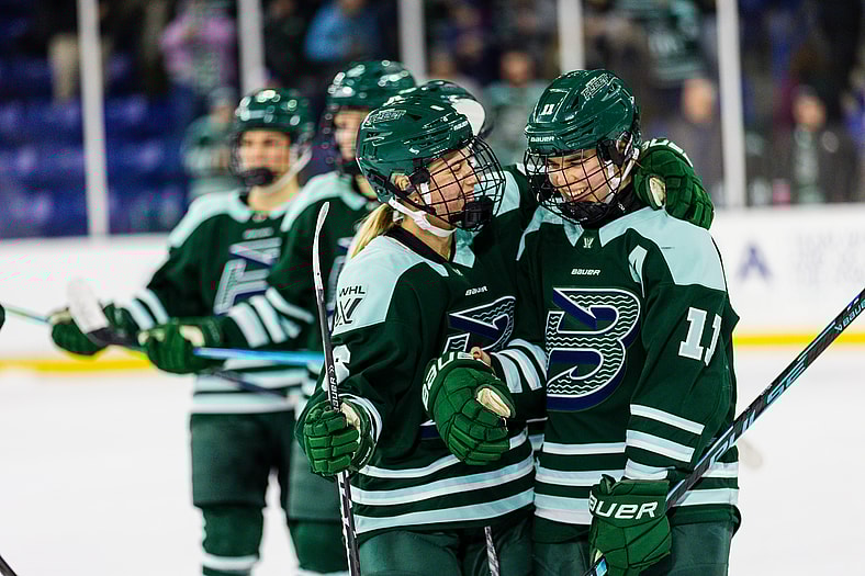 Alina Müller and Hadley Hartmetz celebrate a Boston Fleet shootout victory over the New York Sirens.