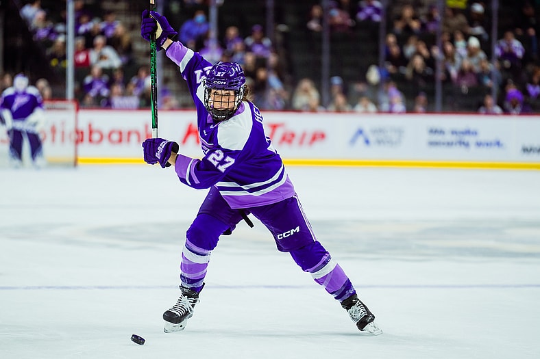 Minnesota Frost forward Taylor Heise winds up for a slap shot against the Vancouver Goldeneyes.